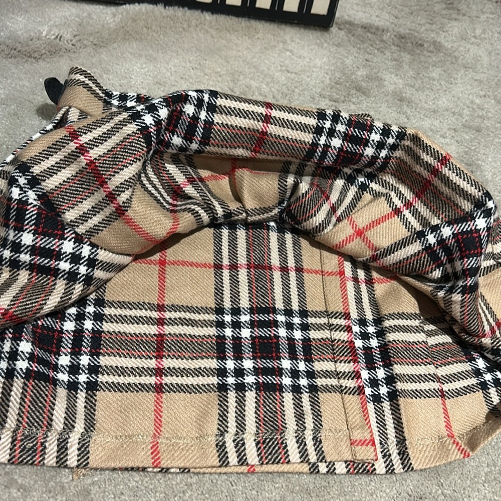 Toddler plaid skirt measures approximately 10 1/2 inches across the waist. - Picture 7 of 8